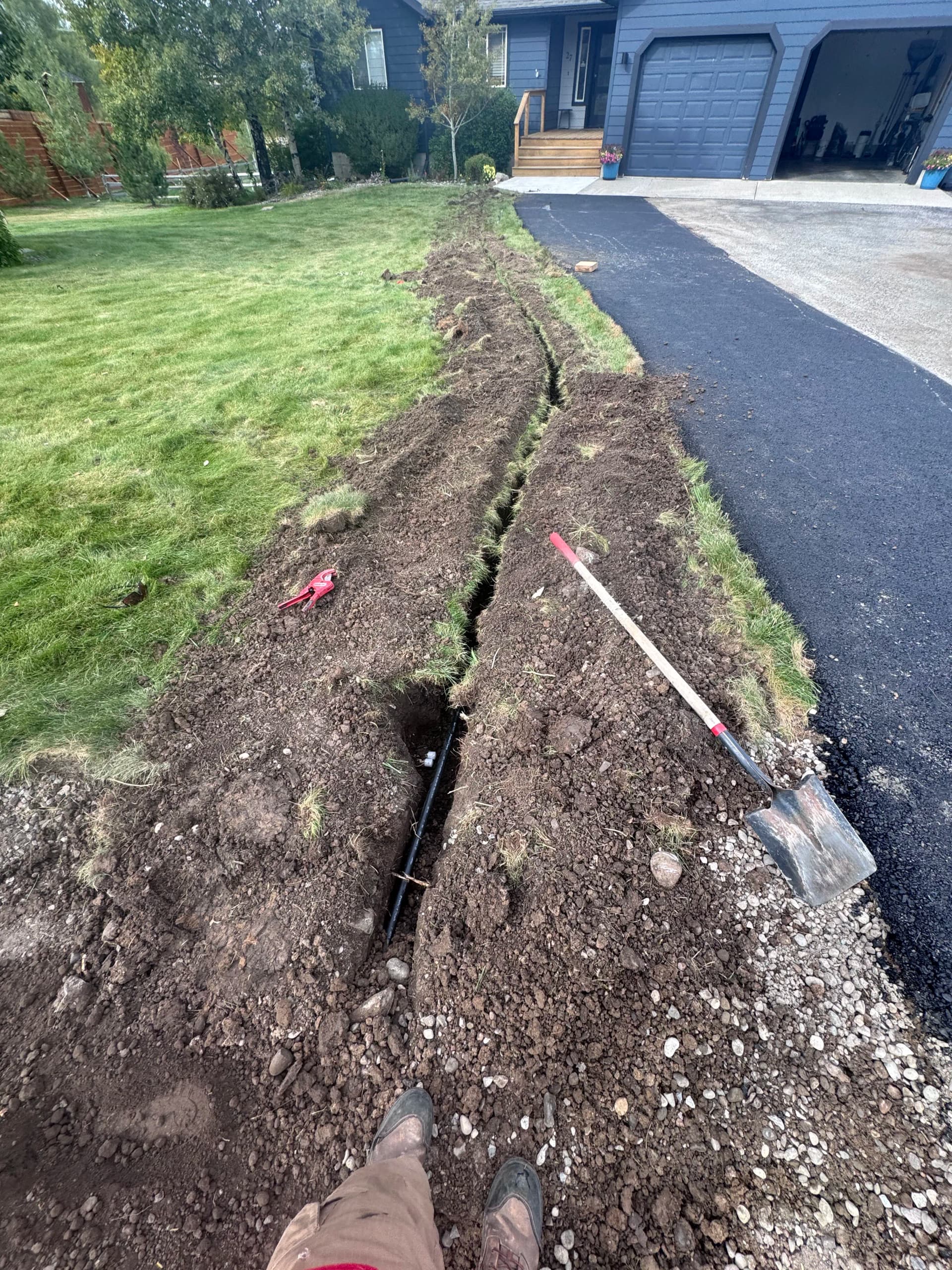 Gallery photos for Dirt Work to Finished Sod Along a Driveway Edge: Image #1