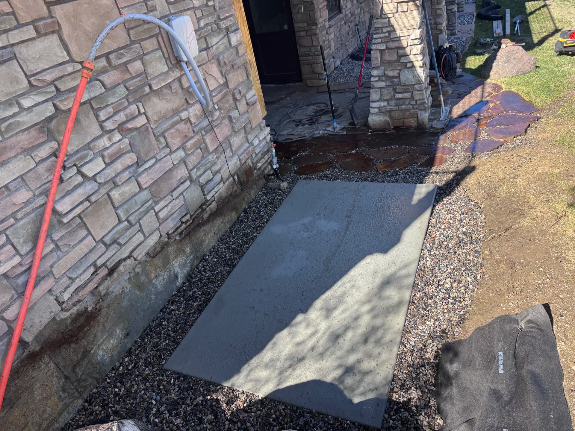 Gallery photos for Concrete Generator Pad and Boulder Retaining Wall Built Right: Image #1
